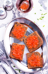 bread with red salmon caviar