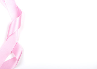 Pink ribbon background on white background.