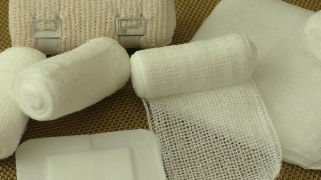 Bandages and plasters on a gold background
