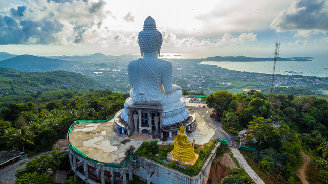 aerial photography white great Phuket’s big Buddha in blue sky.