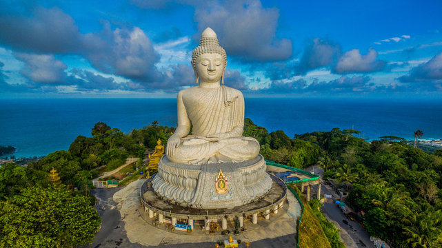 aerial photography white great Phuket’s big Buddha in blue sky.