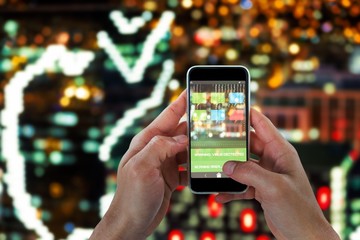 Composite 3d image of close-up of man holding smart phone