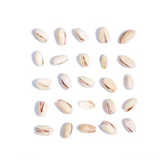 Salty pistachios on white background set