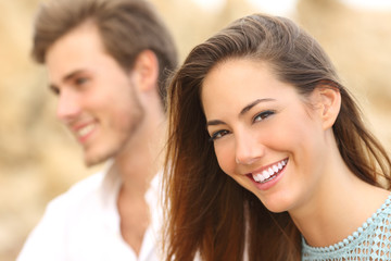 Happy girl with white smile looking at camera