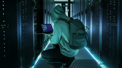 Hacker With Laptop Connects to Rack Server and  Steals Information from Corporate Data Center.