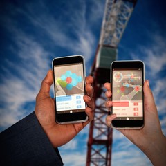 Composite 3d image of hands holding smart phone