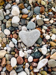 Heart-shaped stone at the beach