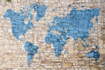 Blue world map on damaged stone wall. elements of this image furnished by NASA.