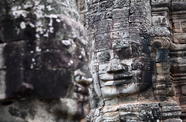Fototapeta na wymiar Ancient stone reliefs of Prasat Bayon temple in Angkor Thom, Cambodia