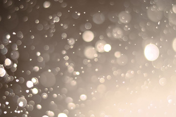 Beautiful bokeh and blurry on a gold background.