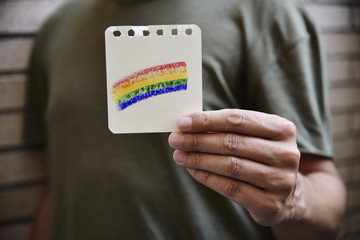 man with a rainbow flag