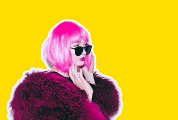 Acid crazy hot beautiful rock Girl in bright pink wig and sunglasses in lama leather swag style red fur winter coat. Dangerous rocky tired of party bored woman Ironically having fun. © tryama
