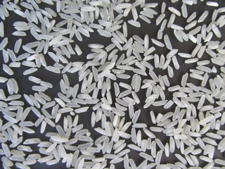 White rice on a black background.