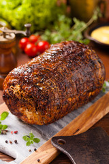 Rolled, roasted pork belly.