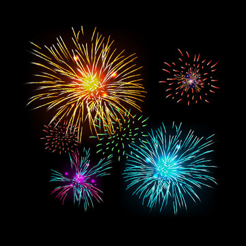 Colorful fireworks isolated on the dark background.