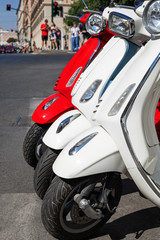 Red and white scooters