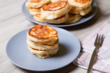 Fritters on kefir, yeast dough. Traditional Russian dish