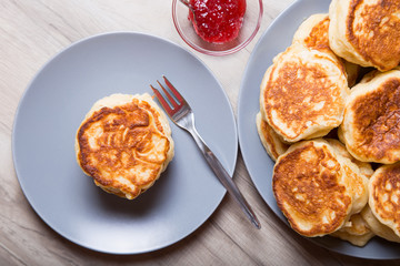 Fritters on kefir, yeast dough. Traditional Russian dish