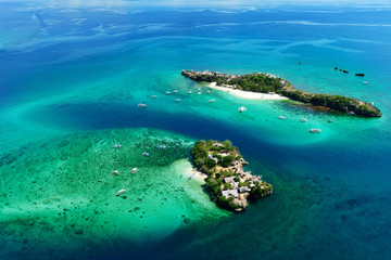 Aerial view of beautiful bay in tropical Island with white sand. Boracay Island, Philippines.