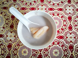 Banana in Coconut Milk. Traditional dessert of asian, Thailand.
