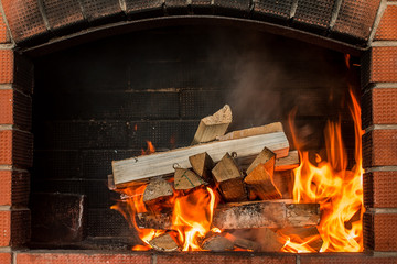 Firewood for coals burn out in the brazier.