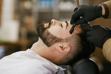Dark haired man at barbershop