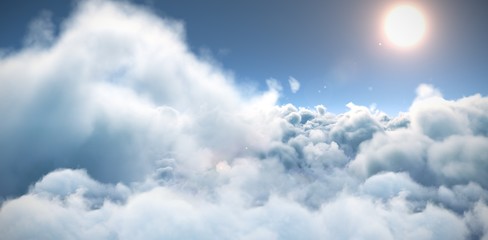 Naklejka na ściany i meble Idyllic view of sun over cloudscape during sunny day