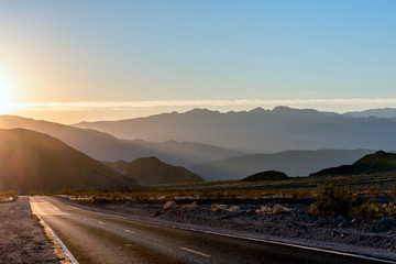 Desert Highway heading to sunset