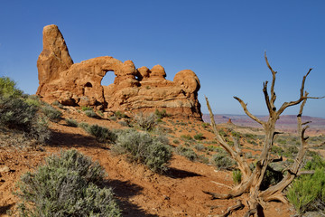 Arid desert landscape surrounding Turret Arch in Arches National Park © F&J McGinn
