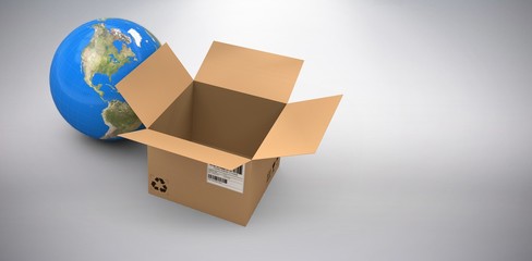 Composite image of 3d image of globe by empty cardboard box