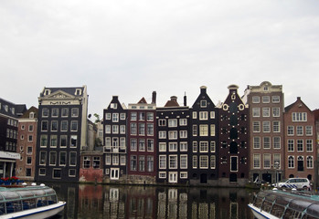Obraz premium Old houses, the embankment of Amsterdam