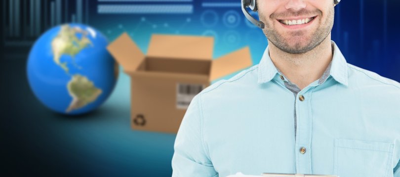 Composite 3d image of hhappy male courier man wearing headset