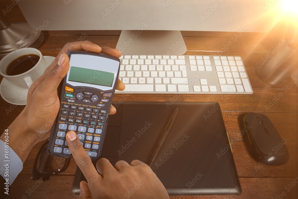 Poster composite image of hands of businessman using calculator