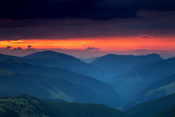 Obraz premium Summer sunrise landscape in the Carpathians Mountains, on Transalpina mountain road, Romania