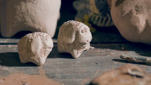 Close up view on clay pottery figurines