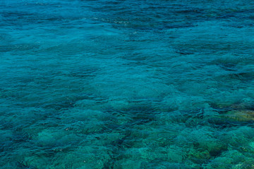 Natural background of emerald, turquoise sea water