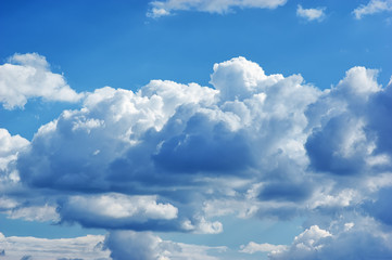 Deep blue sky and clouds at sunny day