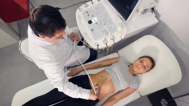Aerial high angle of ultrasound examination of the abdominal cavity 