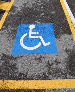 wheelchair symbol on a car reserved parking