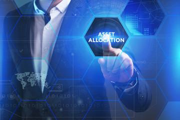 Business, Technology, Internet and network concept. Young businessman working on a virtual screen of the future and sees the inscription: Asset allocation