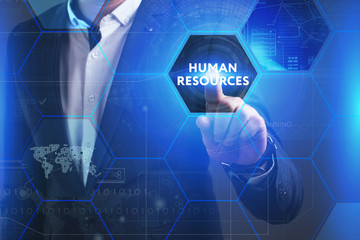 Business, Technology, Internet and network concept. Young businessman working on a virtual screen of the future and sees the inscription: Human resources
