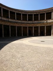 Inner corridors of courtyard of Palace of Charles V at Alhambra fortress in Granada,