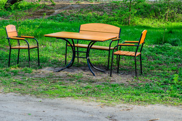 Fototapeta premium Wooden table and chairs outdoor