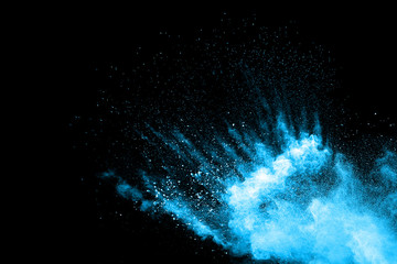 abstract color powder splatted on black background,Freeze motion of color powder exploding.