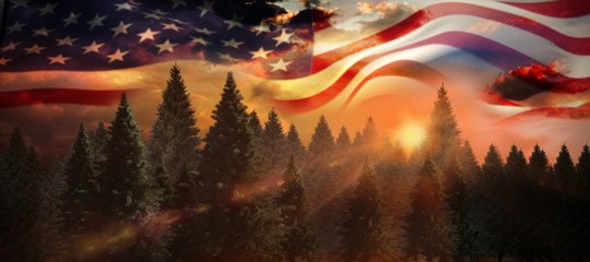 Fototapeta premium Composite image of low angle view of american flag