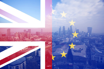 UK flag, EU flag and financial buildings