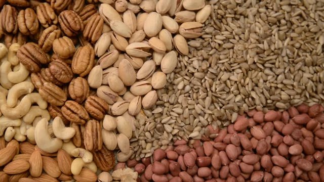Nuts mix in a canvas bag in table.