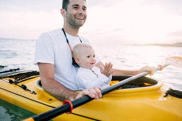 Father and son enjoy time together in kayak