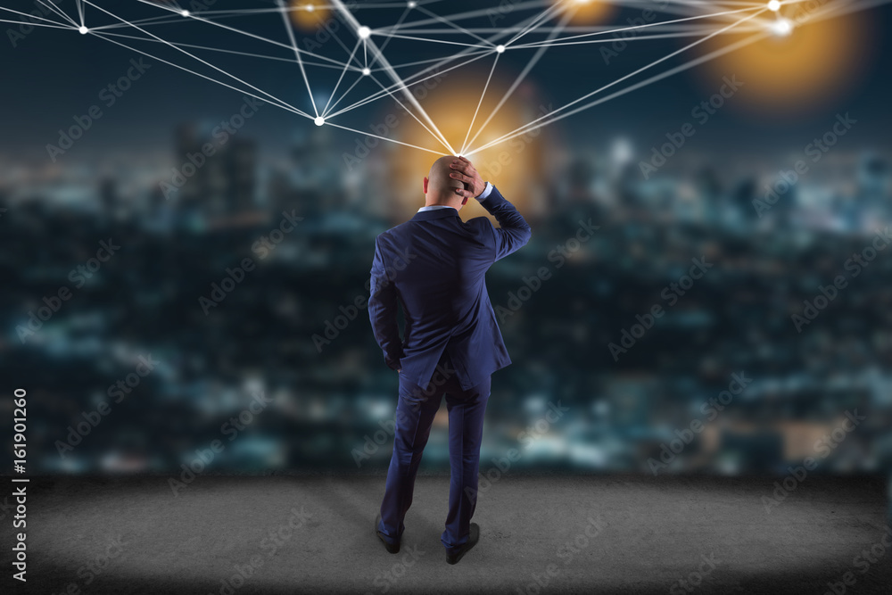Poster businessman in front of a wall with web operating system screen and network connection displayed on 