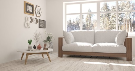 White room with sofa and winter landscape in window. Scandinavian interior design. 3D illustration